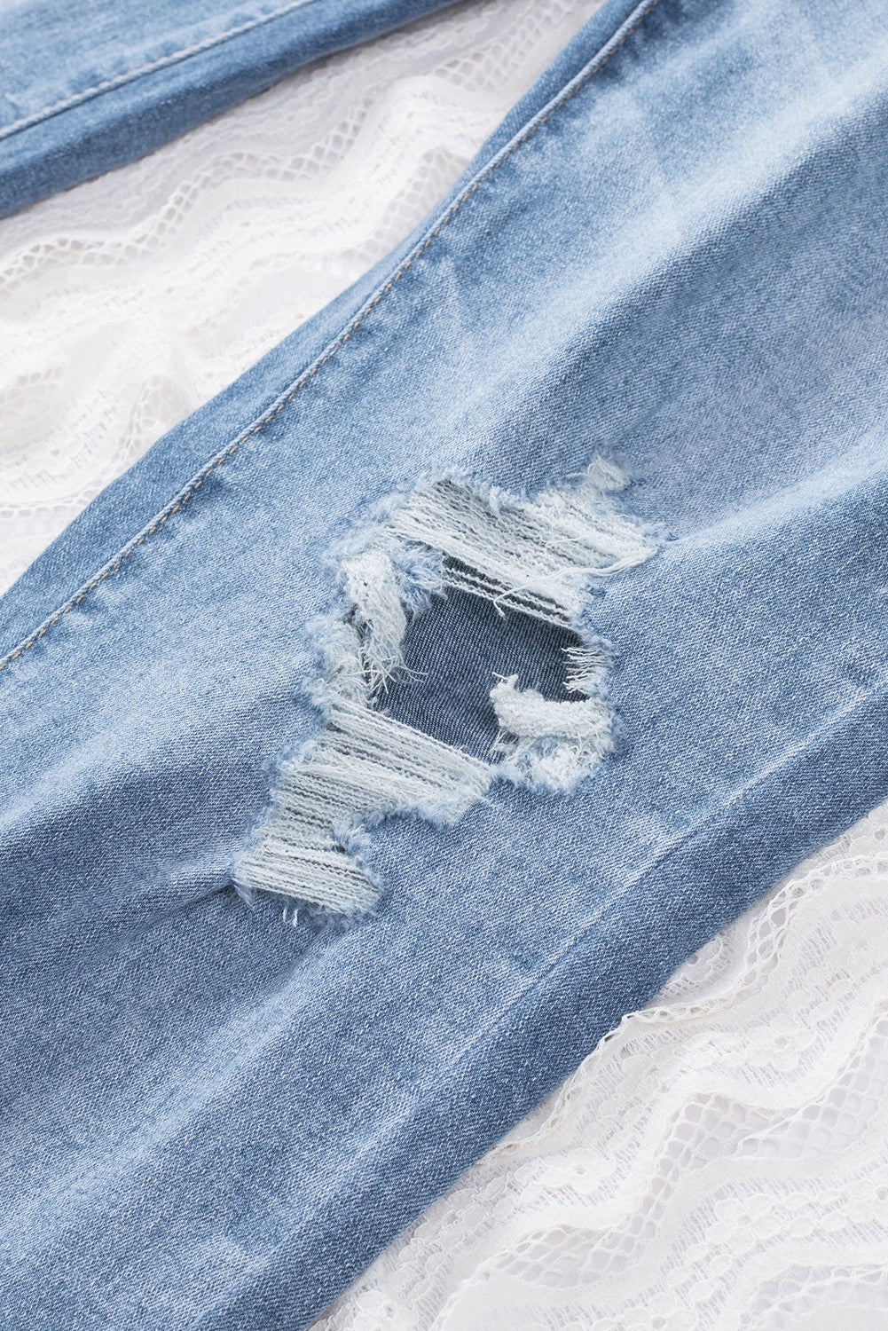 Mid-Rise Light Blue Distressed Skinny Jeans